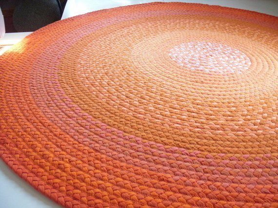 26 Mid-Century Modern Area Rugs That Work in Every Room - 19. Textured Braid Designs 1