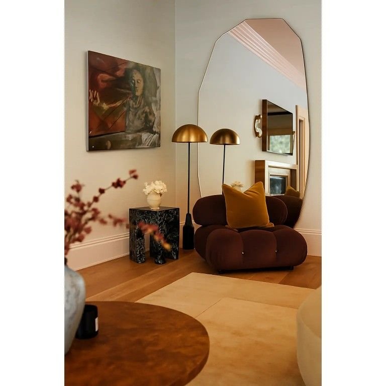 25 CB2 Living Room Ideas Worth Stealing Right Now - 20. Creative Use of Mirrors 1