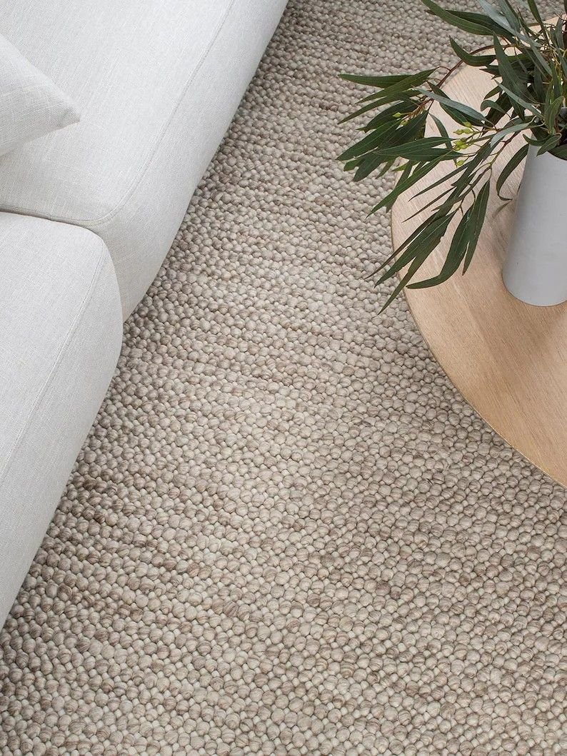 25 CB2 Living Room Ideas Worth Stealing Right Now - 4. Textured Area Rugs 1