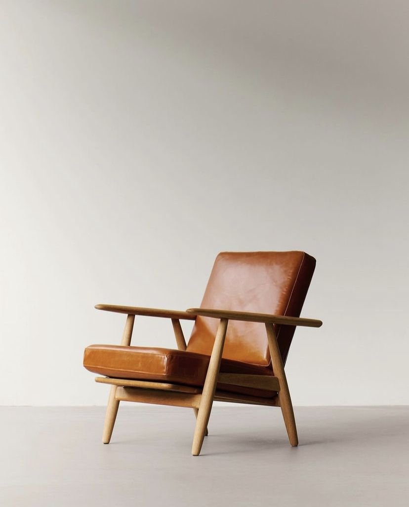 25 Leather Armchair Ideas to Elevate Your Living Room - 22. Sustainable Luxury 1