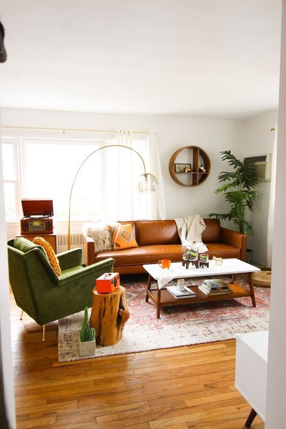 25 Retro Mid-Century Sofa Ideas for a Stylish Throwback Look - 2. Classic Leather: Timeless Elegance 1