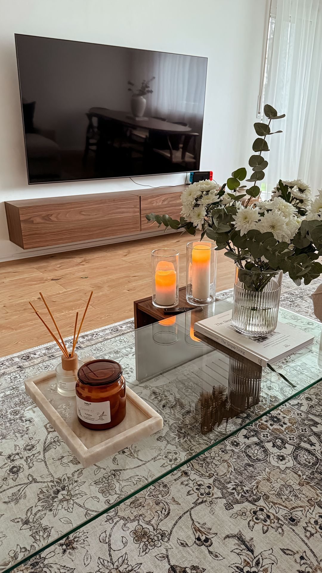26 Glass Coffee Table Ideas That Open Up Your Living Room - 13. Floating Glass Tables 1