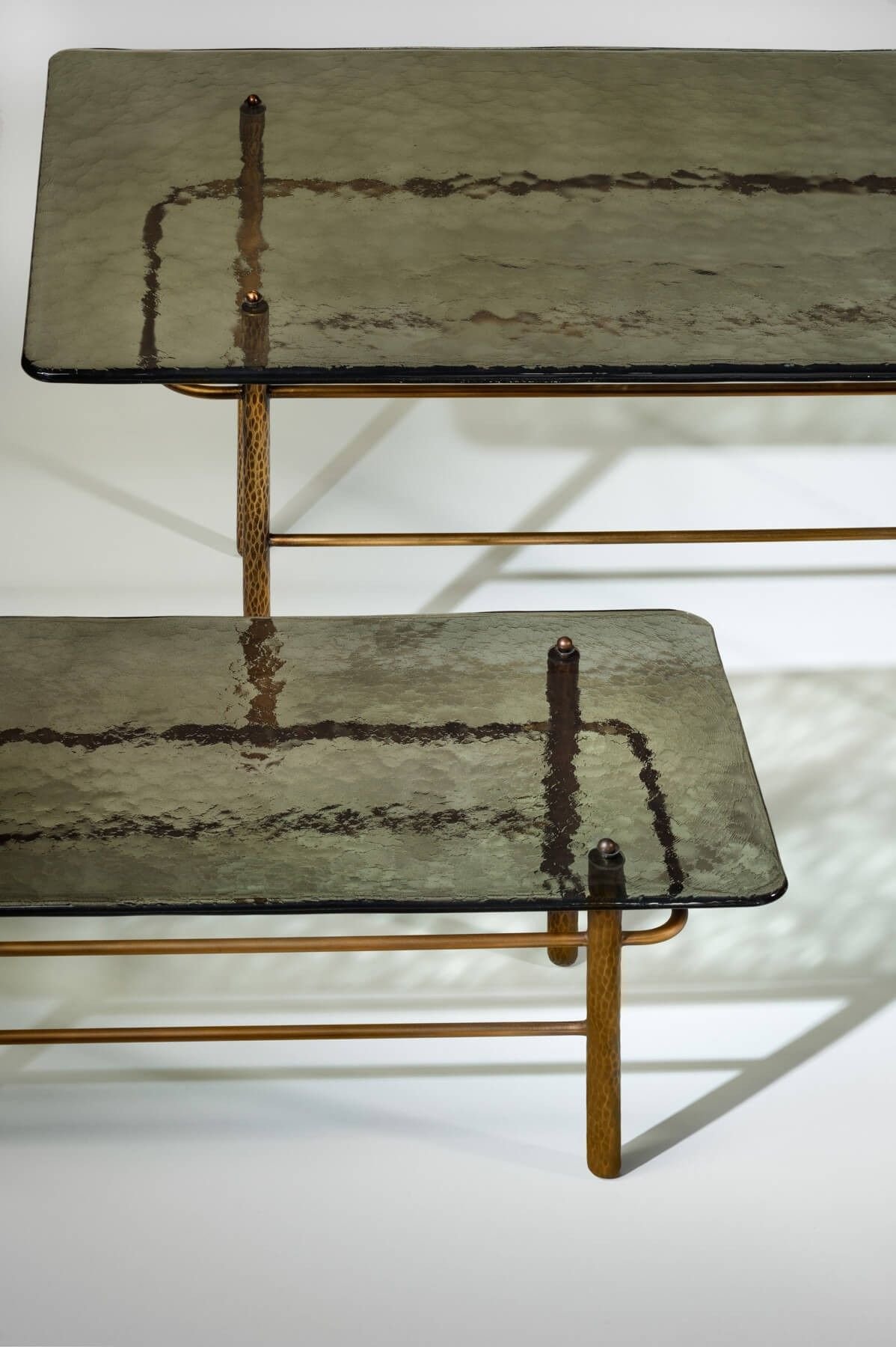26 Glass Coffee Table Ideas That Open Up Your Living Room - 19. Glass Tables with Artistic Bases 1