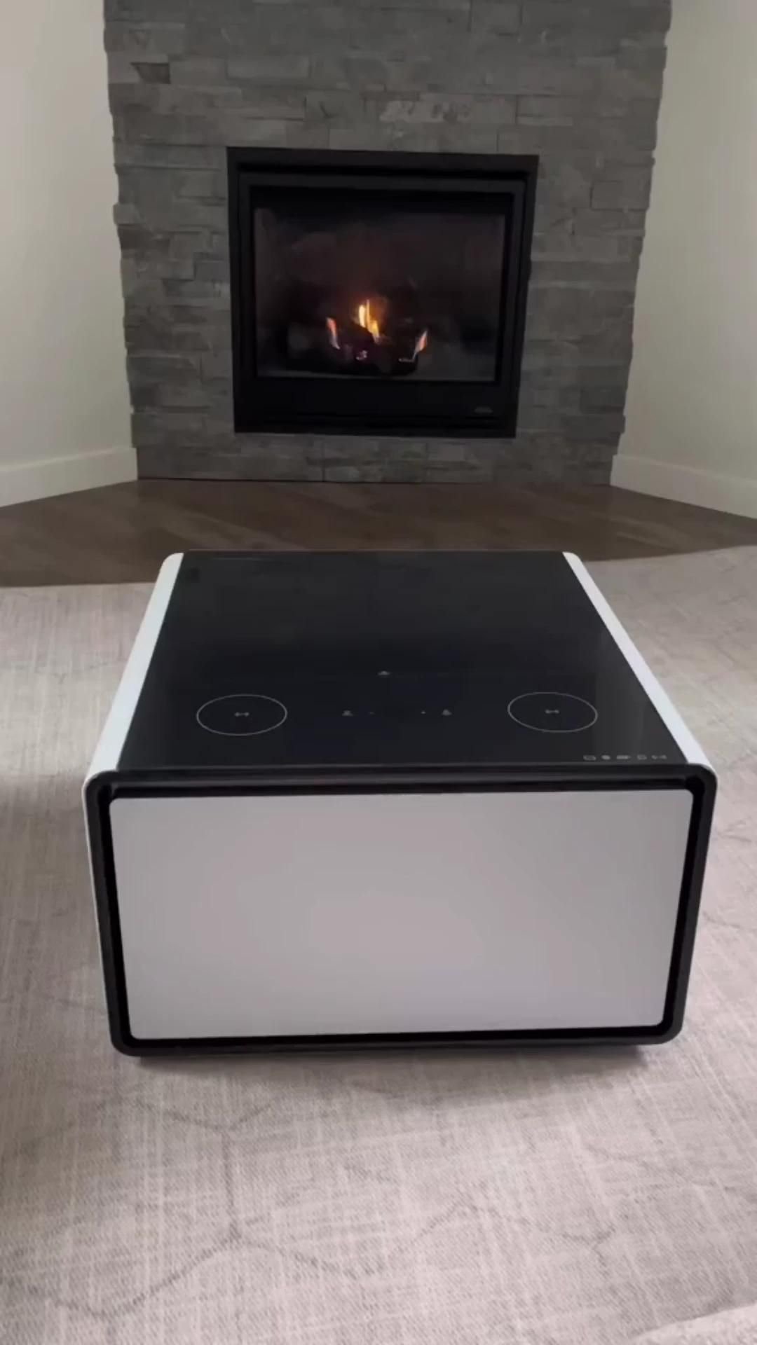 26 Glass Coffee Table Ideas That Open Up Your Living Room - 25. Glass Coffee Tables with Integrated Charging Stations 1