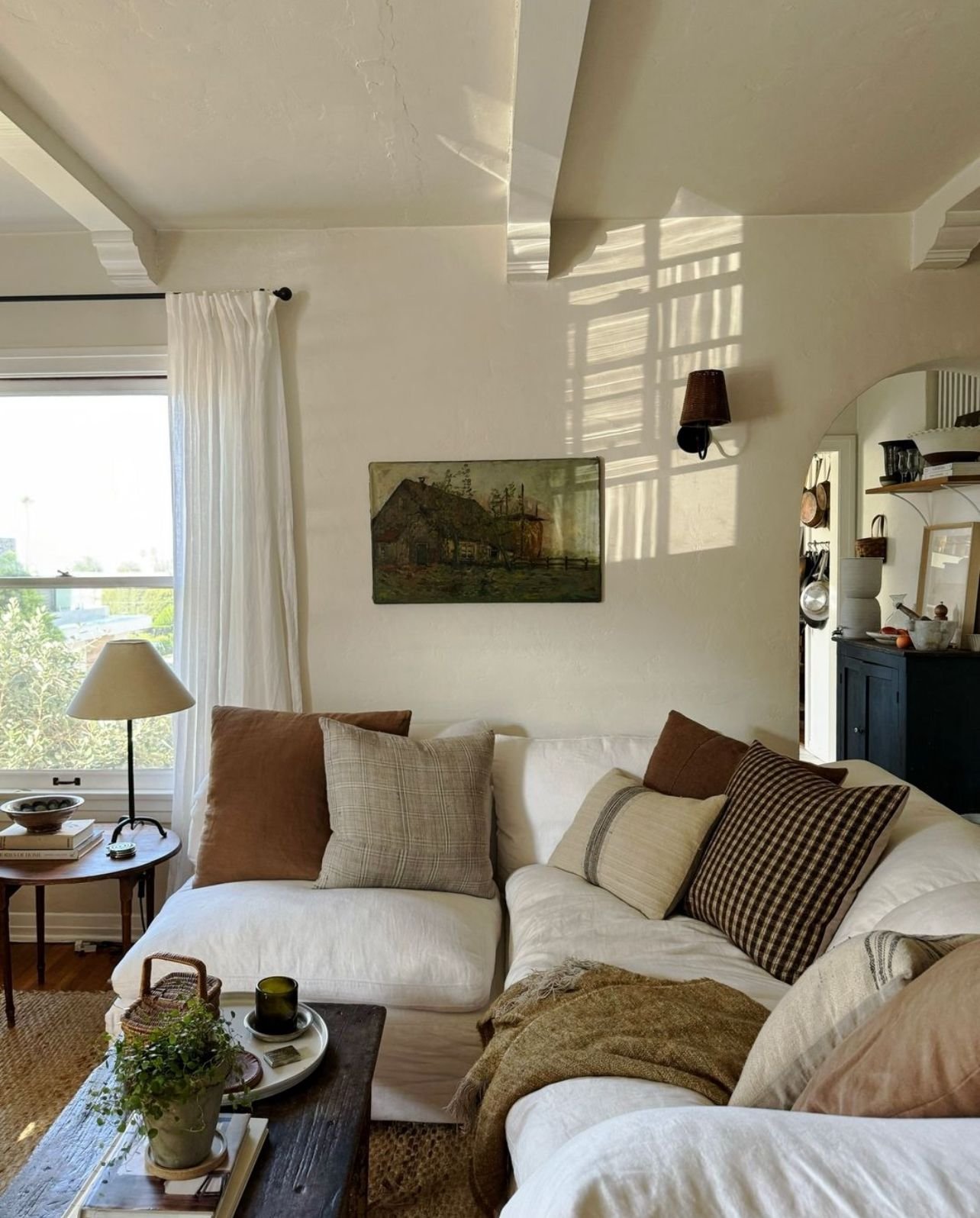 26 Linen Couch Ideas for a Relaxed - 23. Layered Lighting 1