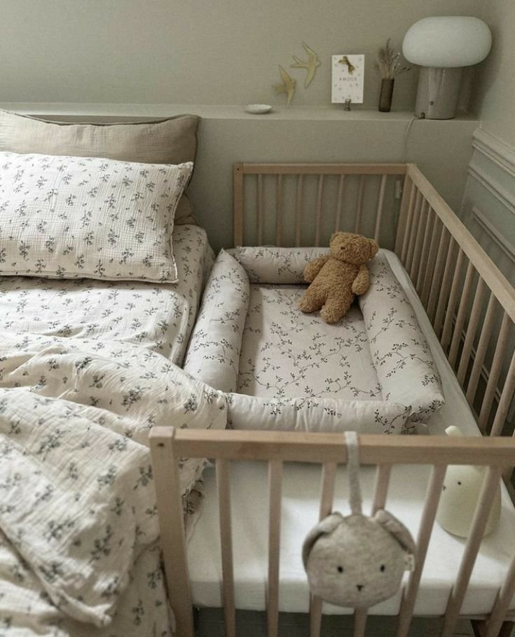27 Comfort Furniture Picks for a Cozy Living Room - 16. Cozy Baby Crib or Sleeper 1