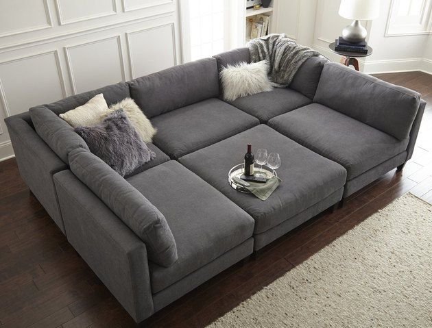 27 Grey Modern Couch Ideas for a Sleek Living Room - 22. Multifunctional Spaces 1