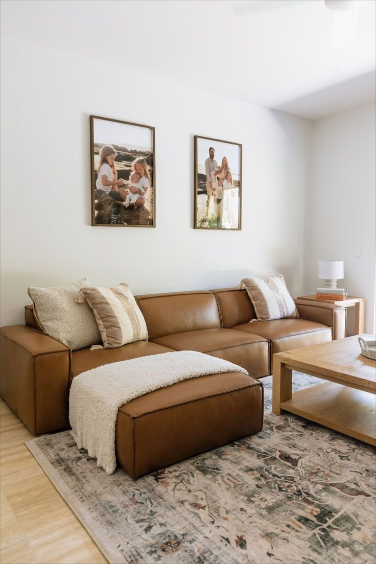27 Leather Couches Living Room Ideas for Every Aesthetic - 1. Minimalist Marvel: Sleek Modern Leather Sofa 1