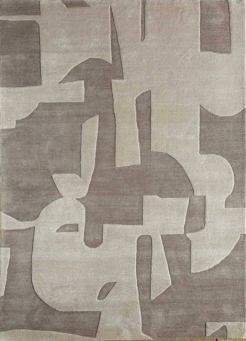 27 Plush Area Rugs That Make Your Living Room Feel Like a Cloud - 11. Geometric Design 1