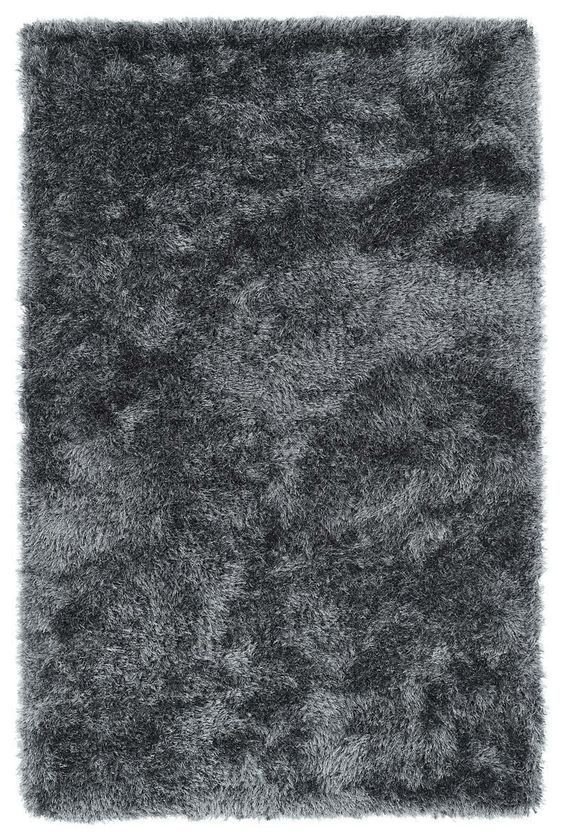 27 Plush Area Rugs That Make Your Living Room Feel Like a Cloud - 25. Celebrating Diversity 1