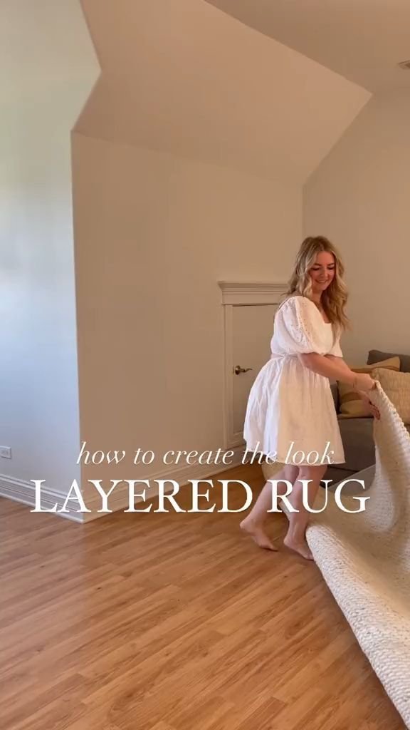 27 Plush Area Rugs That Make Your Living Room Feel Like a Cloud - 8. Layered Rugs 1