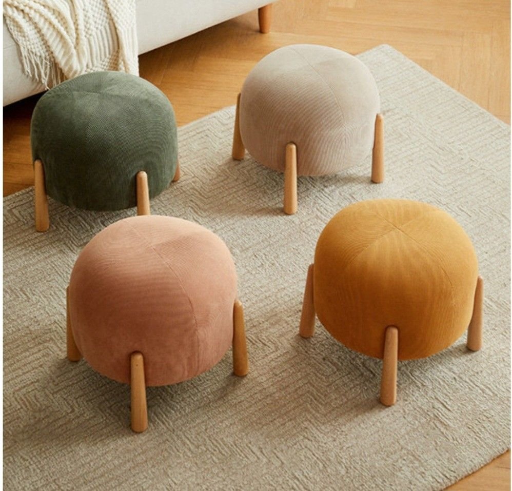 28 Comfy Armchairs That Look Amazing in Any Room - 27. The Versatile Ottoman Chair 1